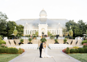 Columbus Ohio conservatory wedding venue showcasing a grand glass structure and formal garden setting